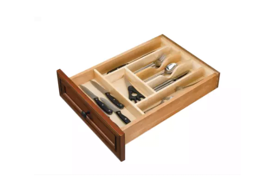 A silverware drawer organizer is pictured - one of our favorite ideas for kitchen organization.